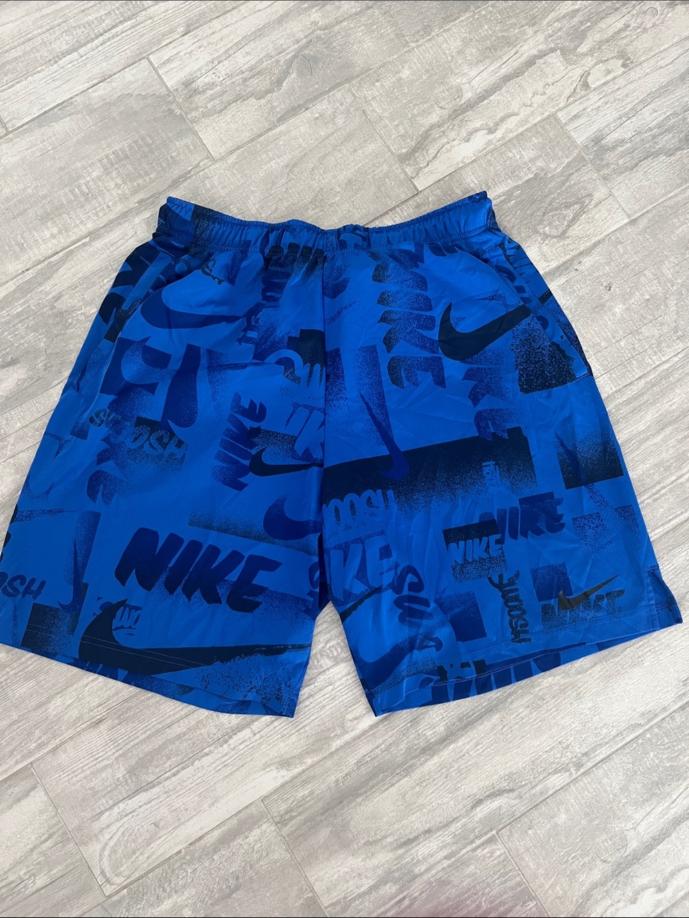 Nike Blue Allover Logo Athletic Shorts